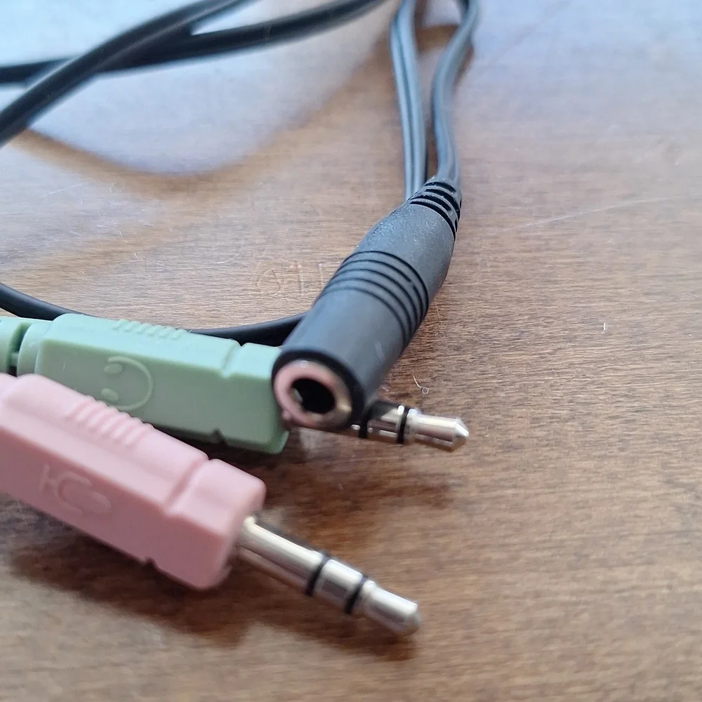 Pink Microphone and Green Audio Cable
